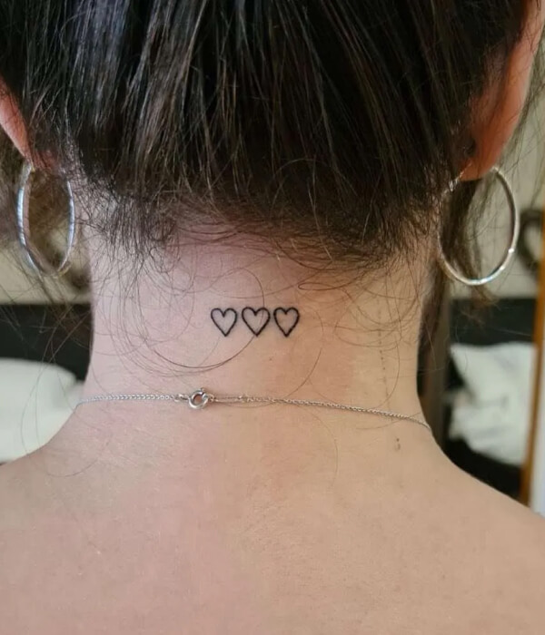 Three hearts back of the neck tattoo