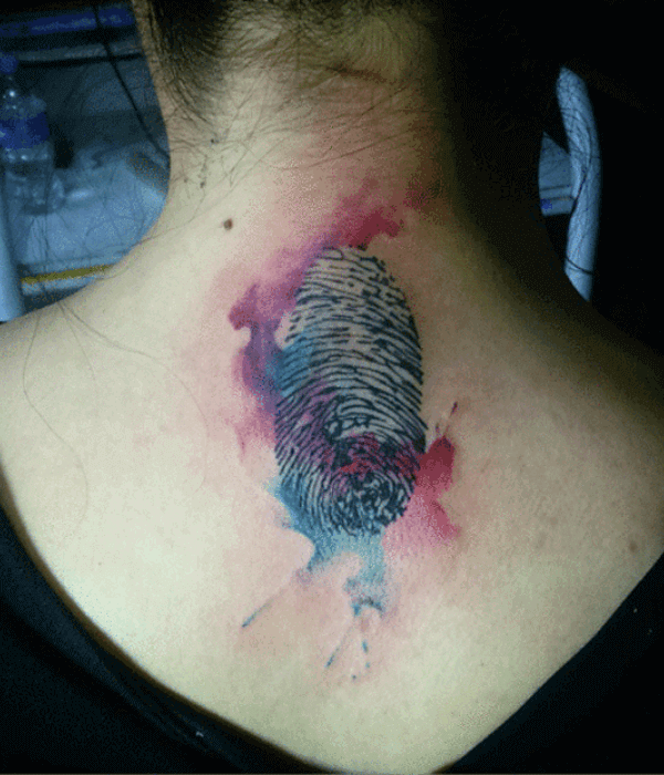 Watercolored fingerprint tattoo