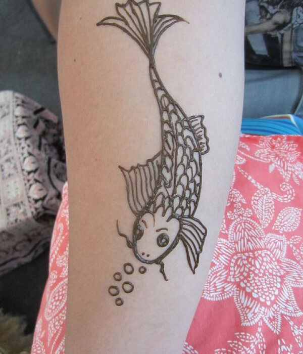 A fish hana tattoo on the hand