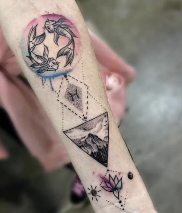 A minimalistic Pisces star and moon arm tattoo