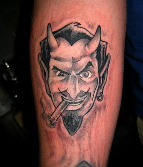 A smoking devil tattoo