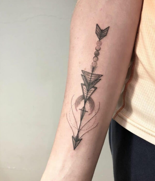 A symbolic arrow tattoo for Pisces men