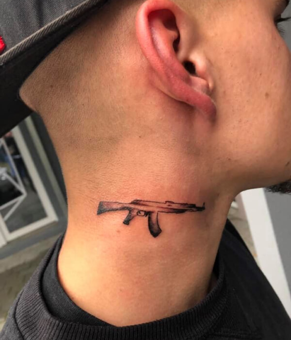 AK 47 tattoo on Neck