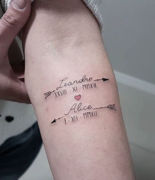 Arrow with baby name tattoo