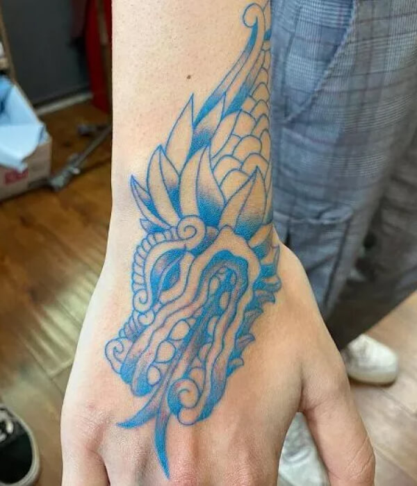 Aztec dragon tattoo