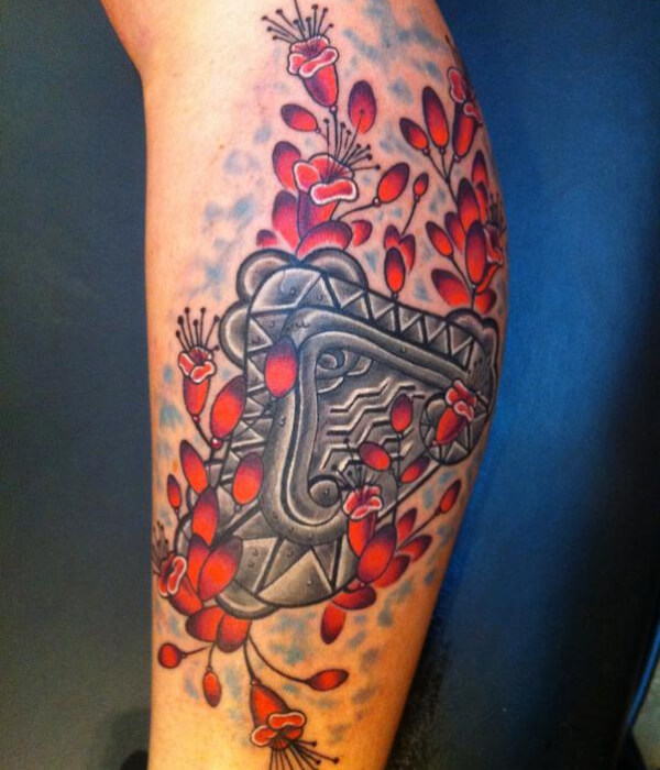 Aztec flower tattoo
