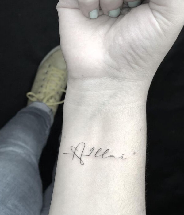 Baby name tattoo on the wrist