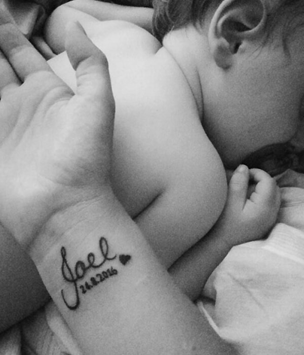 Baby name tattoo on the wrist