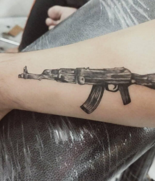 Black AK 47 tattoo