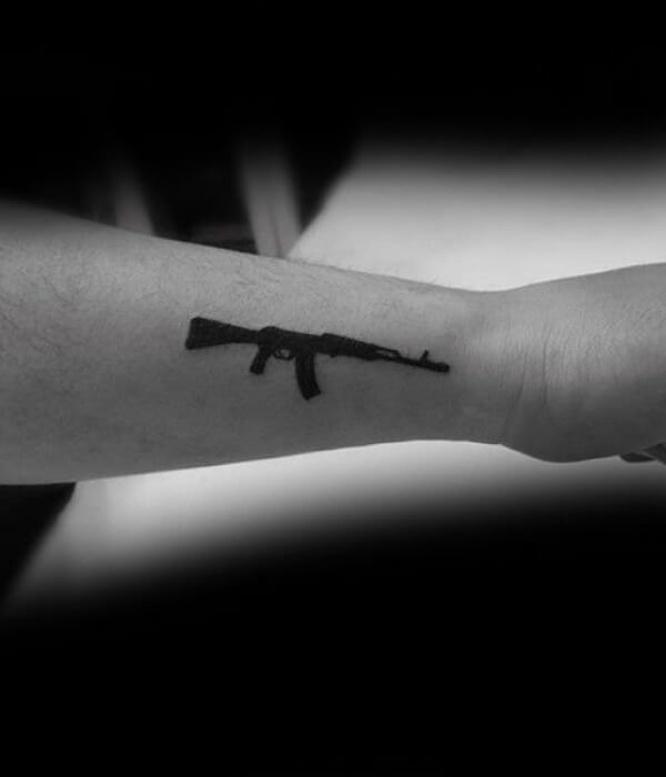 Black AK 47 tattoo