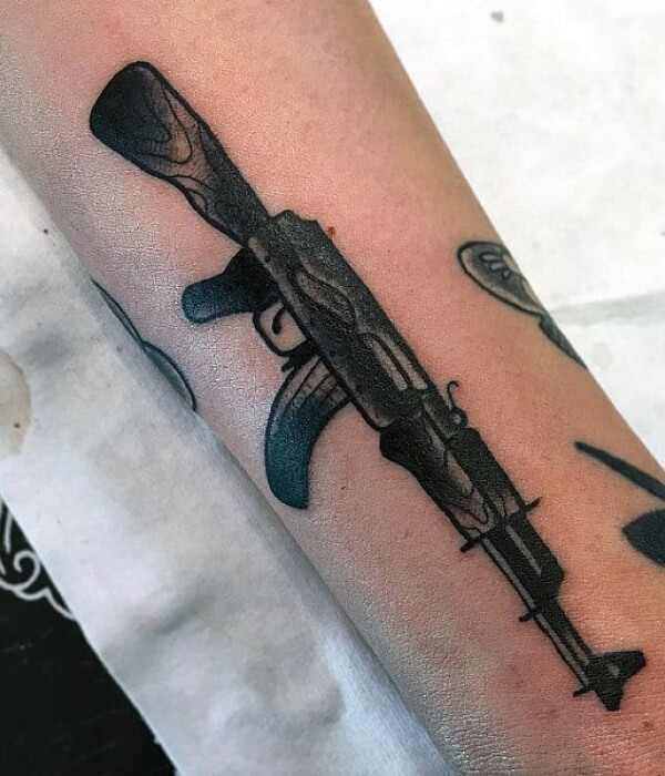 Black and grey AK 47 tattoo design