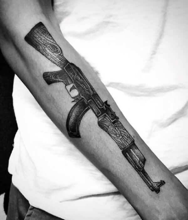 Black and grey AK 47 tattoo design