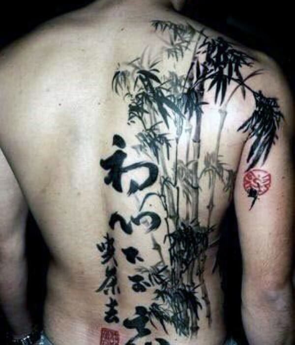 Black and grey bamboo tattoo on the back