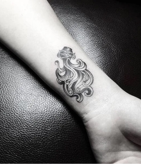 Black and white water bearer Aquarius tattoo