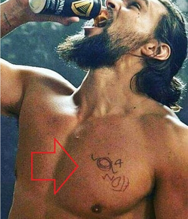 Children signature tattoo on his chest