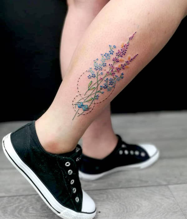 Colorful Aquaris tattoo with flower