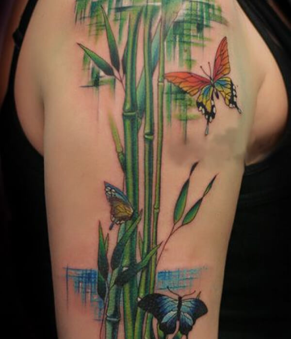 Colorful bamboo tattoo with butterflies