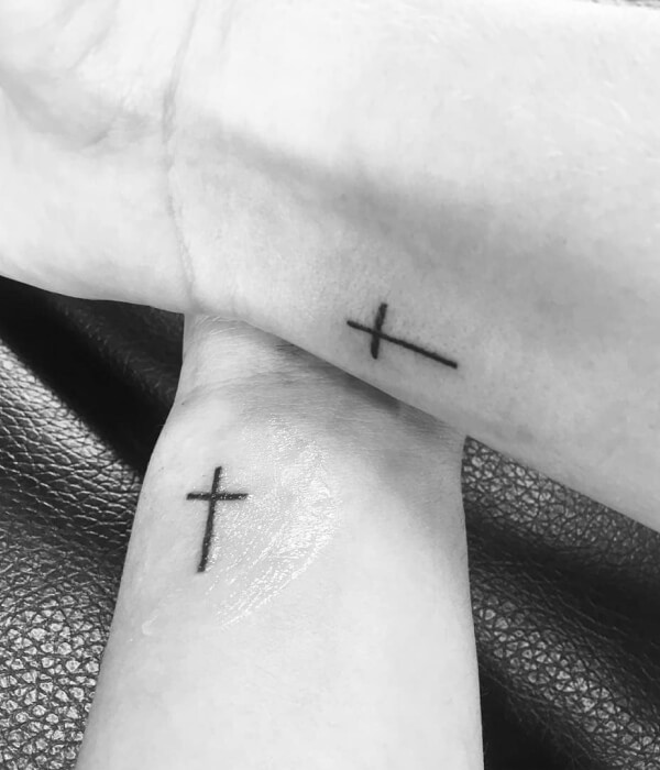 Cross sister tattoo