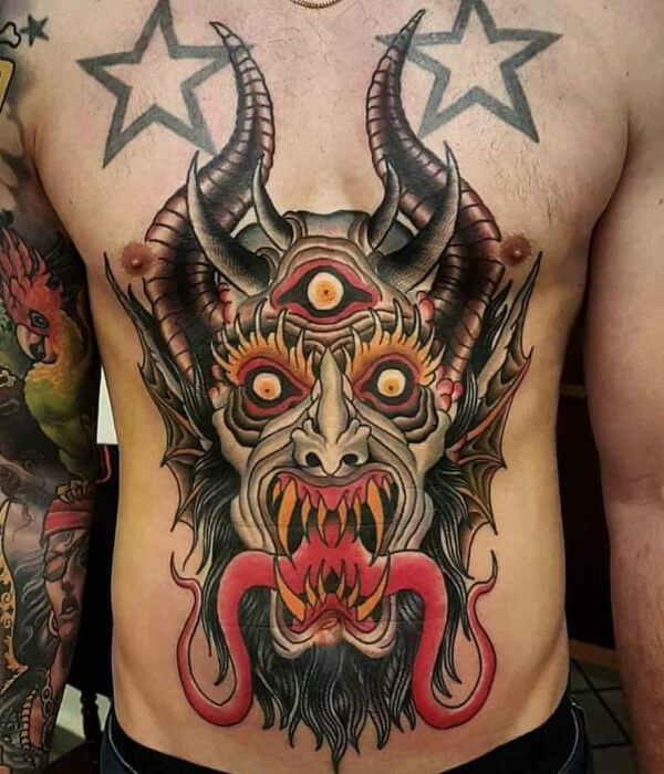 Devil abdomen tattoo