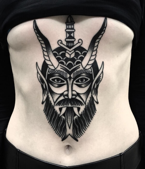 Devil abdomen tattoo