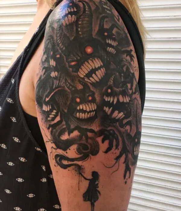 Devil bicep tattoo