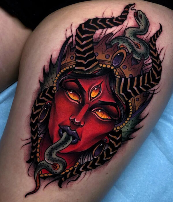 Devil thigh tattoo