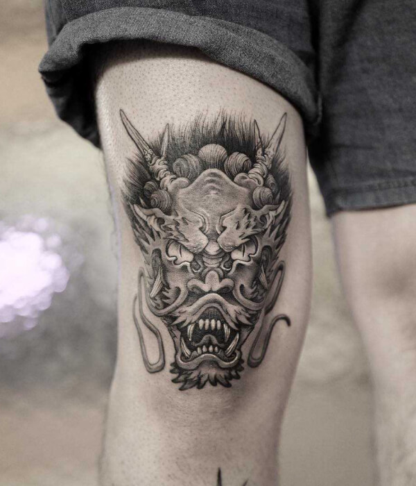 Devil thigh tattoo