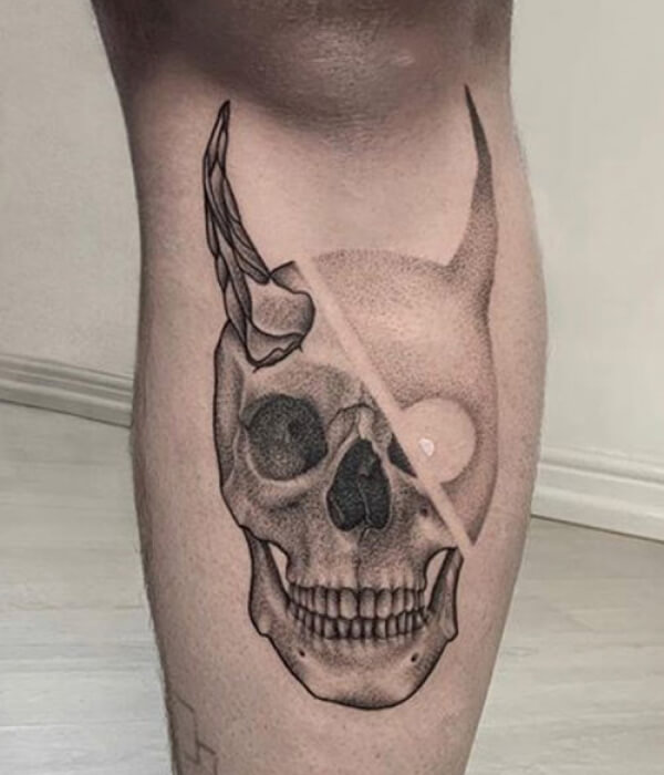 Dotted devil knee tattoo