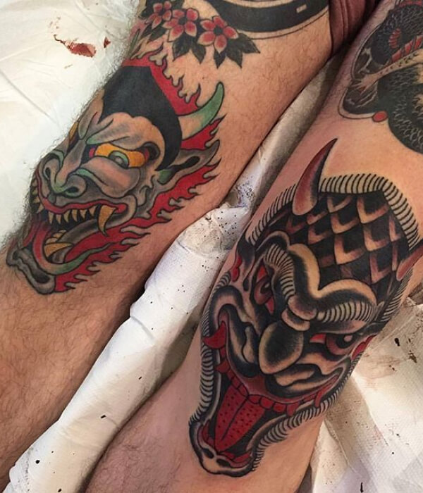 Dotted devil knee tattoo