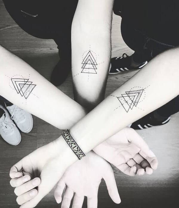 Geometrical sister tattoos