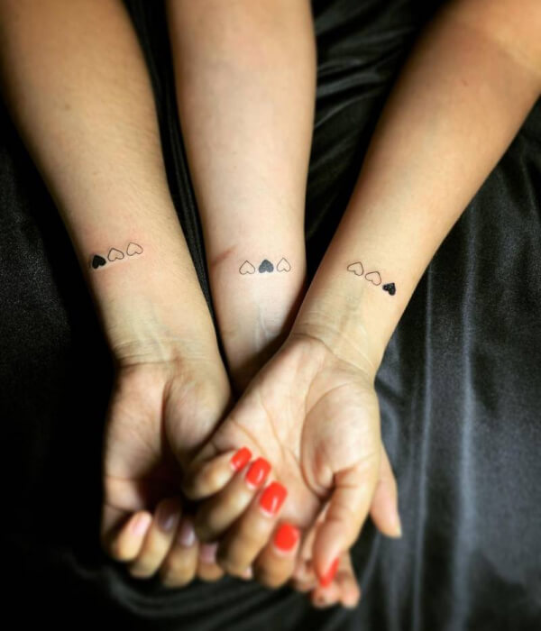 Heart sister tattoo