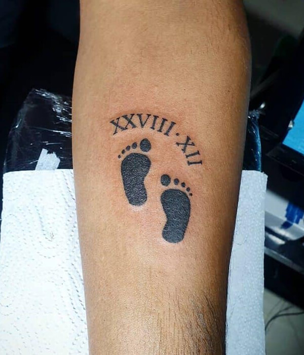 Little baby feet tattoo