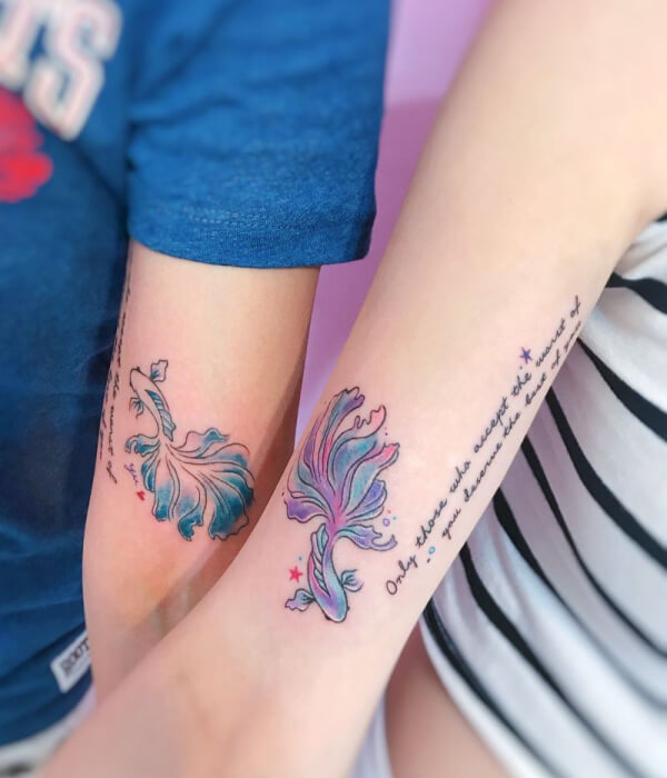 Matching pieces watercolor wrist tattoo