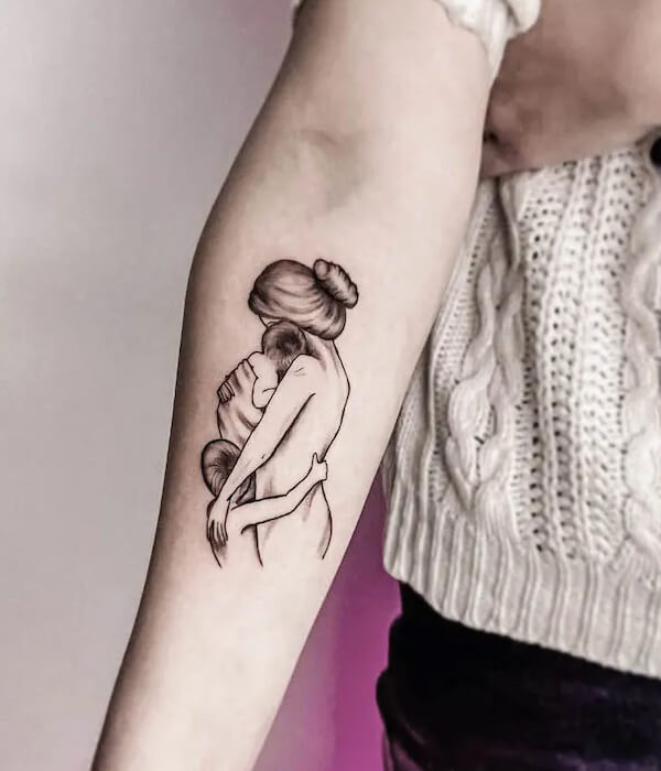 Mom and baby silhouette tattoo