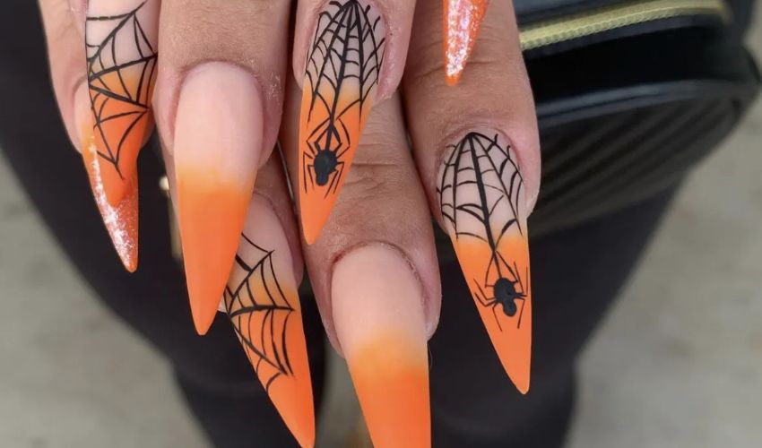 black orange nail tattoo