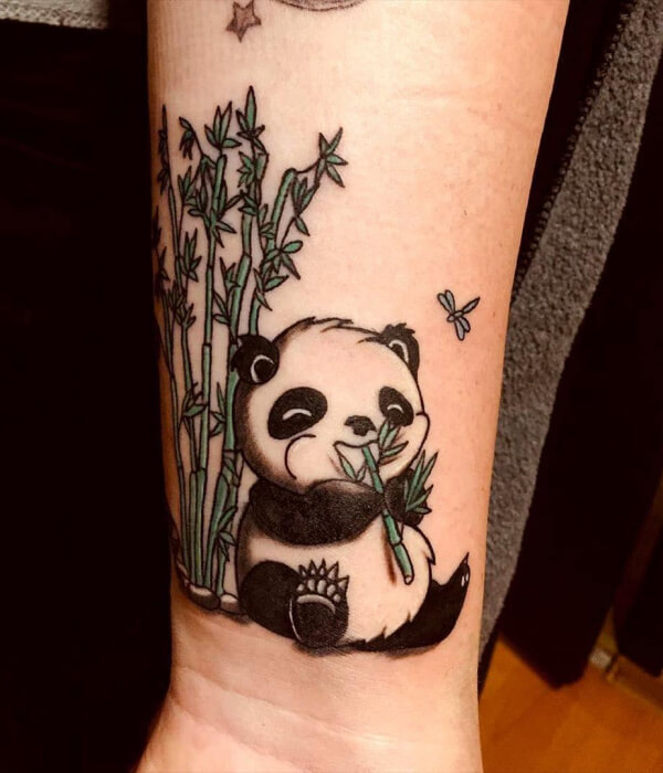 Panda eating bamboo tattoo