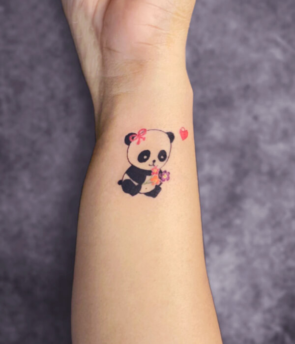 Panda tattoo on hand