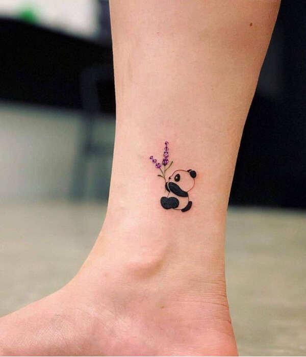 Panda tattoo on leg