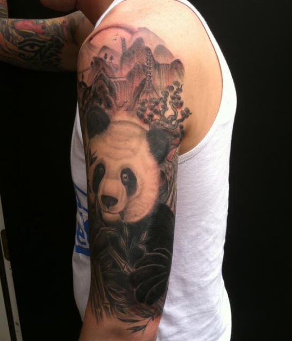 Panda tattoo sleeve in realistic ink