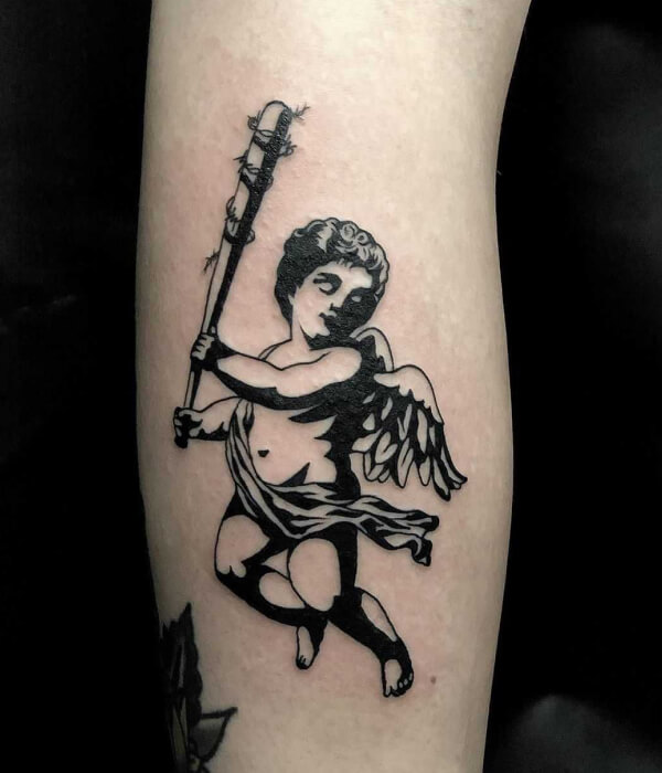 The full-body cupid-like devil tattoo