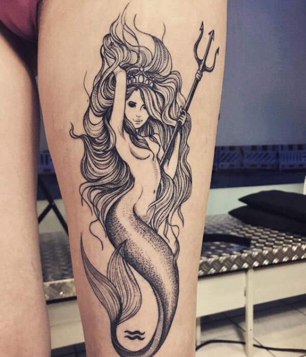 Traditional Aquarius tattoo on the arm