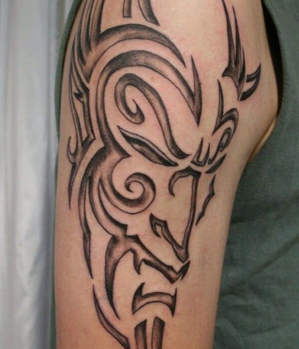 Tribal devil tattoo