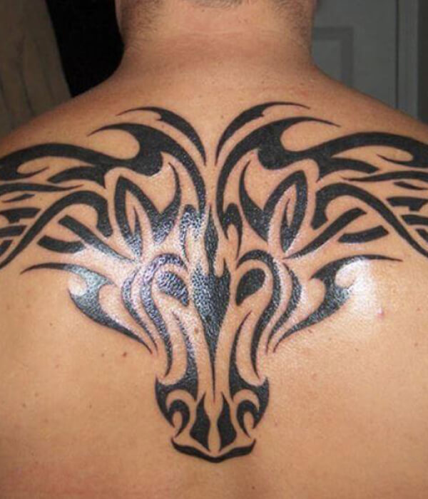 Tribal devil tattoo
