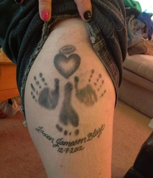 Two kids names with a handprint and footprint tattoo