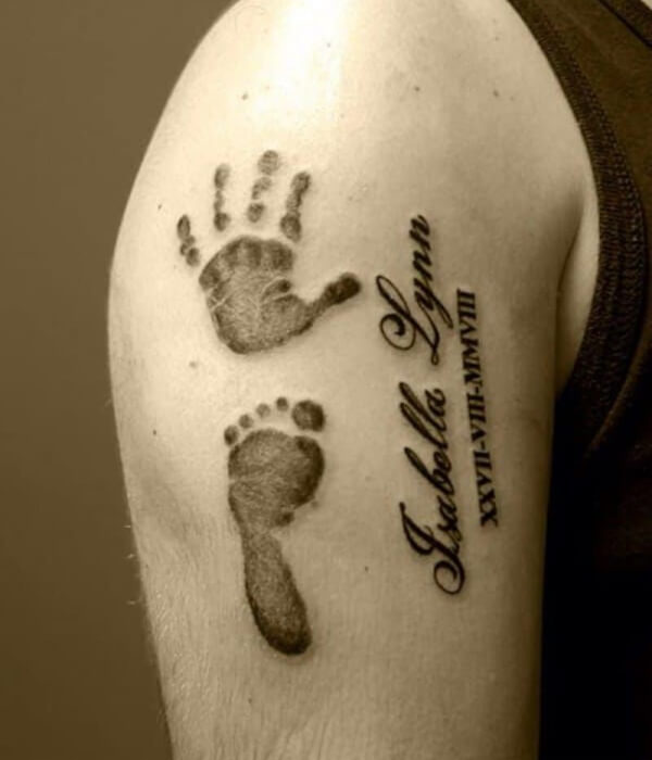Two kids names with a handprint and footprint tattoo