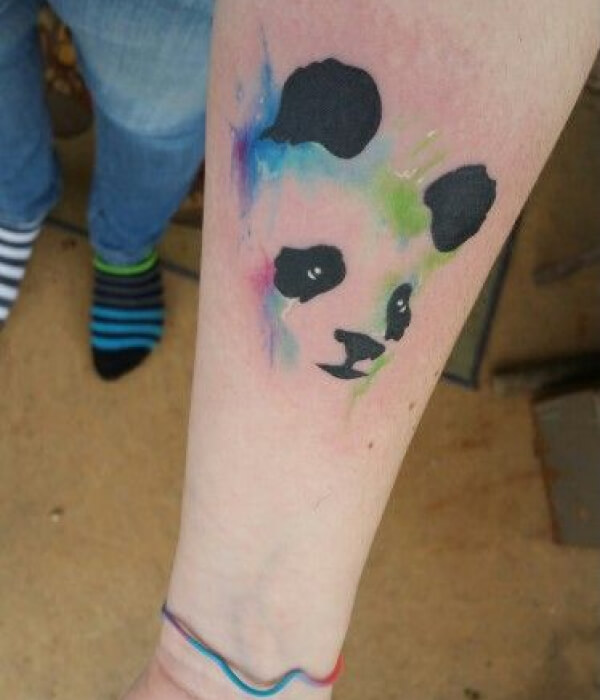 Watercolor kawaii panda tattoo on the ankle