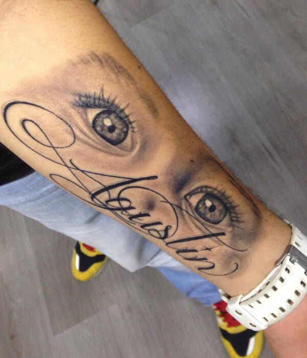 Baby eye tattoo with the name