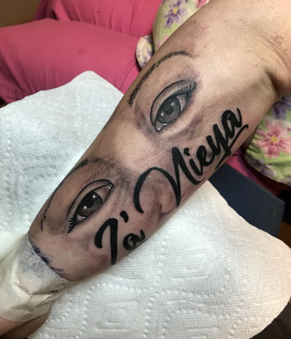 Baby eye tattoo with the name