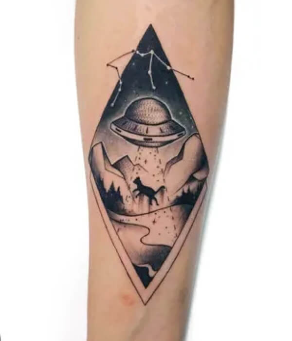 Alien and rocket tattoo