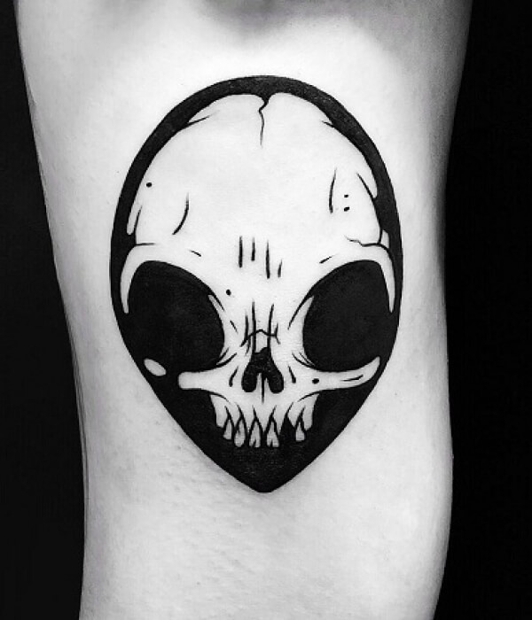 Alien skull tattoo